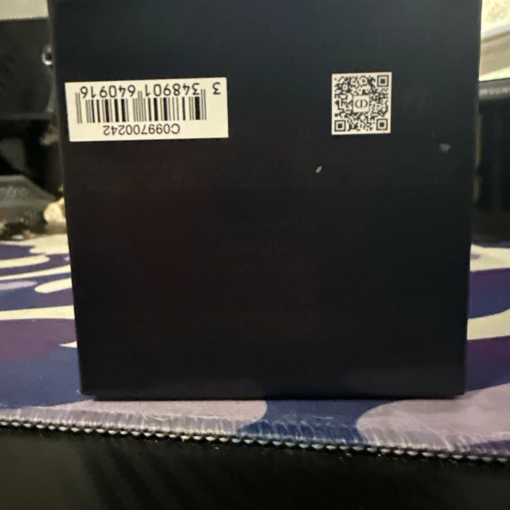 Dior Black Camera Lens Cap with Gloss Finish